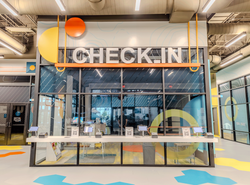 church environment design | Stop Apologizing About Your Space Blog cover photo - photo of church check-in space at compass church fort worth