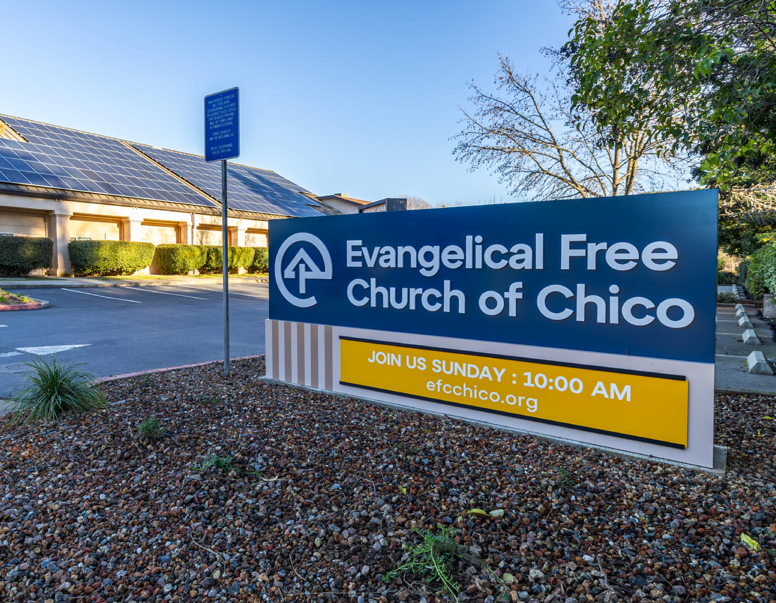 Monument signage for Evangelical Free Church of Chico featuring branded logo and service time display, designed by Enviropop