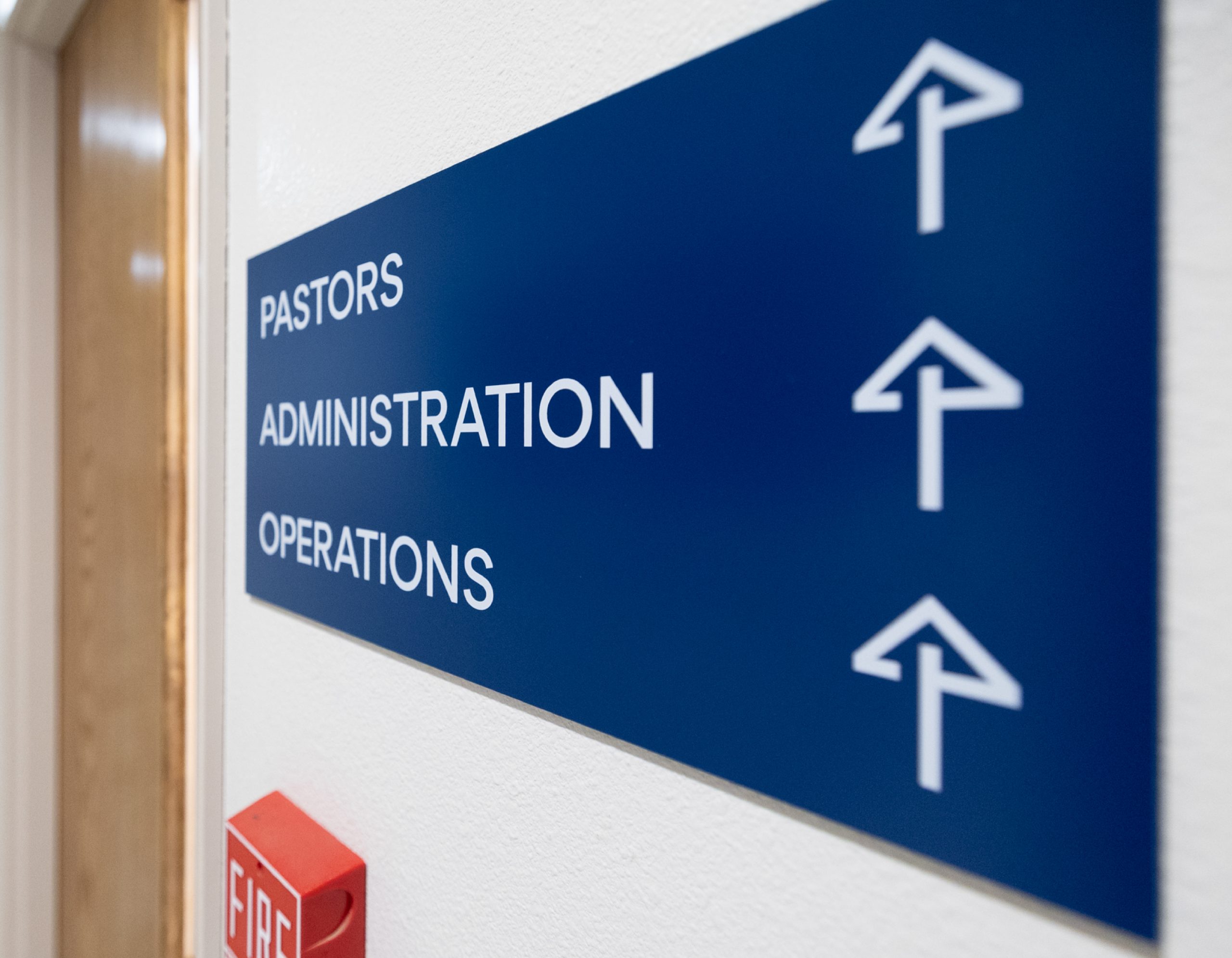 Interior directional wayfinding sign for Pastors, Administration, and Operations at Evangelical Free Church of Chico